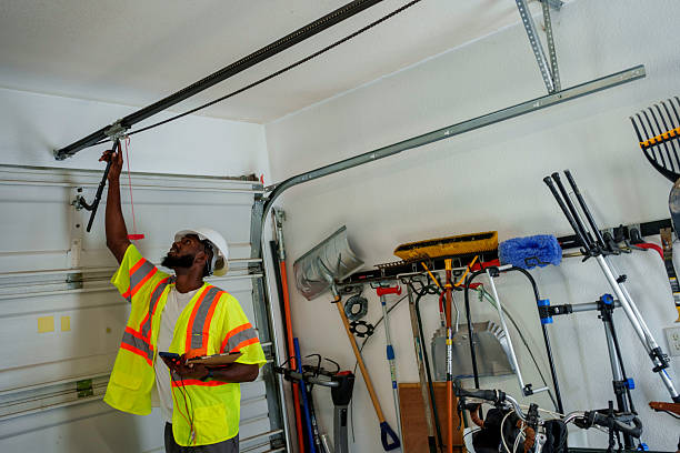 Professional Garage Door Panel Replacement technician working in Manassas city County, VA